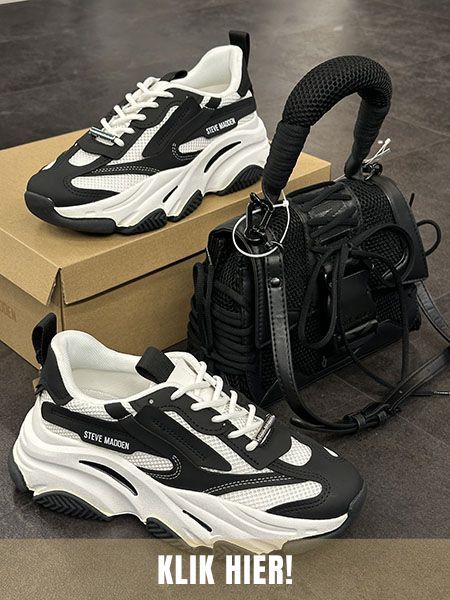 Zwart-wit Possesion sneakers met de bijpassende zwarte Steve Madden Bdiego tas.